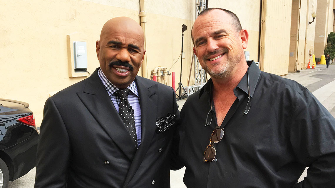 Family Feud host Steve Harvey and director Ken Fuchs